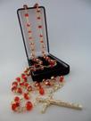 Terço cristal aust. vermelho 8x6mm esp. - folh. ouro