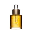 Tratamento de óleo facial Clarins Santal 100% Extratos Naturais