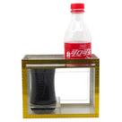 Truque mágico: a garrafa de Coca-Cola se divide e desaparece por turno