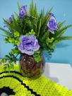 Vaso com flor artificiais