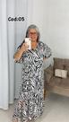 Vestido de Malha Que Acompanha Um Cinto Do Mesmo Tecido.