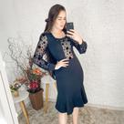 Vestido preto com manga de tule