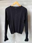 Blusa tricot tranca frente manga babado