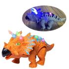 Brinquedo Infantil Dinossauro Triceratops Laranja / Cinza com Som, Luz e Movimento