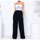 Calça casual pantalona botão duna