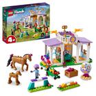 Conjunto de brinquedos LEGO Friends Riding School com 2 cavalos e 2 bonecas