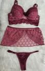 Conjunto lingerie com todo em renda com minissaia