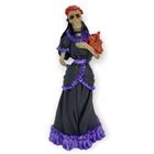 Escultura Pomba gira caveira roxo 27 cm em resina