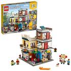 LEGO Creator 3 em 1 Townhouse Pet Shop & Café 31097 Toy Store Building Set com banco, Town Playset com um bonde de brinquedo, figuras de animais e minifiguras (969 peças)