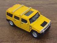 Miniatura Hummer H2 SUT 2005 Kinsmart 1/40 Metal e Fricção Amarela