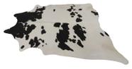 Tapete de couro. Pele em formato natural. L 1,90 x C 1,90 m. Preto e branco. Ref. P724C