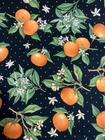 Tecido Estampado Laranja no Fundo Poá Preto e Laranja 50x150cm