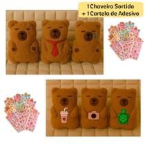 1 Chaveiro de Pelucia Capivara Sortido + 1 Cartela de Stikers Adsivo Capiara 1 Chaveiro de Pelucia Capivara Sortido + 1 Cartela de Stikers Adsivo Capiara