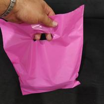 1 Quilo de sacolas plásticas boca triste 30x40 na cor rosa 1º linha , tratadas para impressão.