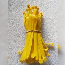 10 pares de tiras de chinelos modelo tradicional, cores variadas.