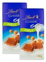 2 Chocolate Lindt Classic Ao Leite Com Avelãs Pedaços 90G