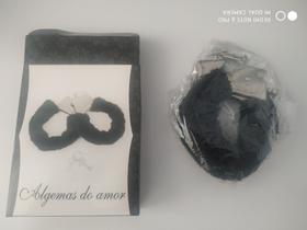 Algema de metal com pelucia