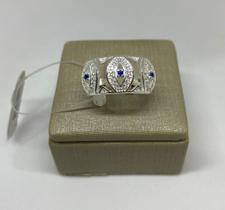 Anel prata 925 com pedrinha azul.