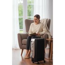 Aquecedor a Óleo 1500W Portátil Conforto Silencioso Preto/Ci Aquecedor a Óleo 1500W Portátil Conforto Silencioso Preto/Ci