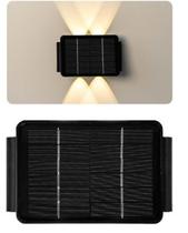 Arandela solar lia 70lm 3000k 4 fachos preta - g-light