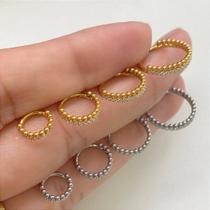 Argola aço balls clicker dourada com zircônias cristais