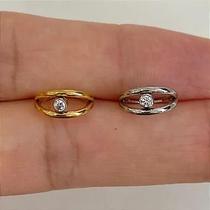 Argola aço cristal solitário clicker - dourado com cristal