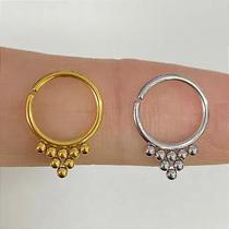 Argola aço daith satara torção - dourada com pvd