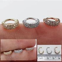 Argola clicker triple hélix em ouro 18k com zircônias suiças