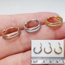 Argola titânio conch duo clicker com zircônias e fecho clicker