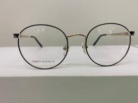 Armação feminina dourada redonda