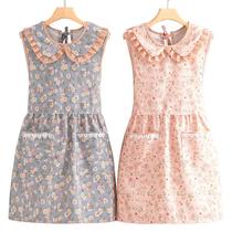 Avental floral sem mangas para mulheres com design de gola de boneca Avental floral sem mangas para mulheres com design de gola de boneca