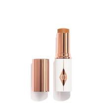 Base em Bastão Charlotte Tilbury Unreal Skin Tint 12 Tan Base em Bastão Charlotte Tilbury Unreal Skin Tint 12 Tan