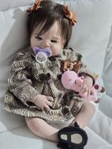 Bebê Reborn Barata 100 Silicone pode Dar Banho Igualzinha a foto