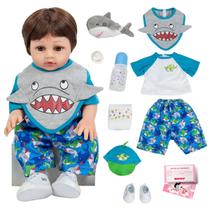 Bebê Reborn Boneca Menino Tubarão Realista Brastoy Corpo Silicone Pode Dar Banho Conjunto de Roupa Chupeta Mamadeira e Pelúcia