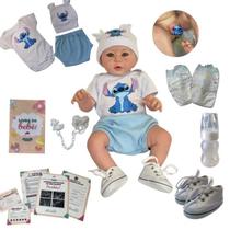 Bebê Reborn Menino Realista Ana Dolls 50cm MAMA, FAZ XIXI E TOMA BANHO Carequinha Enxoval Completo de 12 Itens