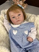 Bebê reborn sindrome de down menina com macacão