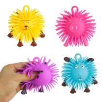 Bichinho Arrepiado Anti Stress com Luz LED para Apertar e Esticar - Amarelo Bichinho Arrepiado Anti Stress com Luz LED para Apertar e Esticar - Amarelo