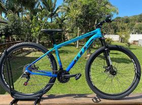 Bicicleta Aro 29 Gti Roma Alumínio 21v Freio a Disco Garfo Suspensão Pneu com Faixa Bege - Azul/Azul