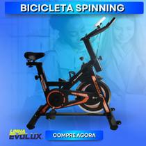 Bicicleta Spinning Ergométrica 13 Kg Preta e Amarela Roda de Inercia até 130kg Mecânica Desempenho e Estilo para Seus Treinos Potência em Movimento - EVOLUX