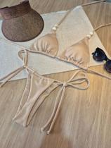 Biquini cortininha fio dental amarração lateral Bojo Removivel bronze perfeito moda praia verão 2026