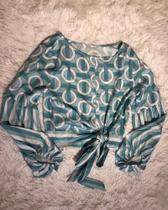 Blusa cropped de manga bufante Blusa cropped de manga bufante