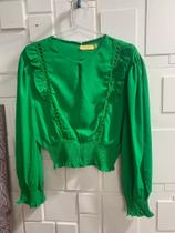 Blusa de sedã