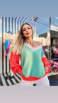 Blusa de tricot color gola v