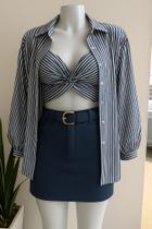 Blusa feminina listrada com manga longa e modelagem soltinha Blusa feminina listrada com manga longa e modelagem soltinha