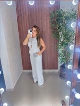 Blusa Malha Frente Unico Com Bojo Detalhe Laços Cravejado