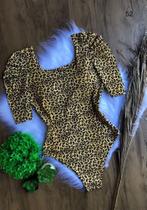 Body de onça com manga bufante Body de onça com manga bufante