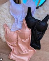 Body feminino tamanho médio disponível na cor branca,rosae preto