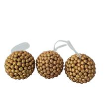 Bolas de natal revestida com bolinhas douradas