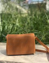Bolsa caramelo com alça em silicone. Bolsa caramelo com alça em silicone.