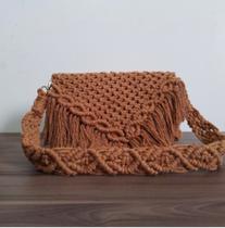 Bolsa com detalhes